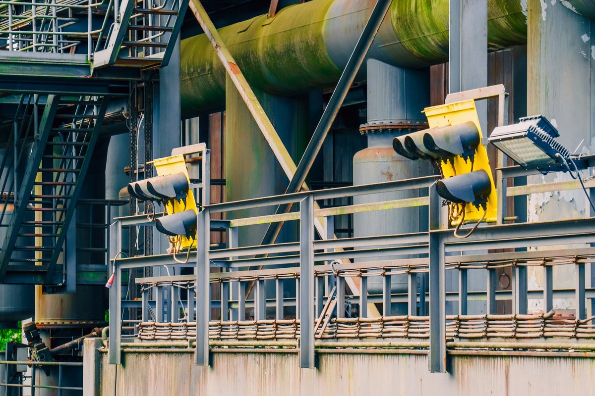 On-site ESG audit at an industrial facility - assessing emissions monitoring equipment and compliance documentation